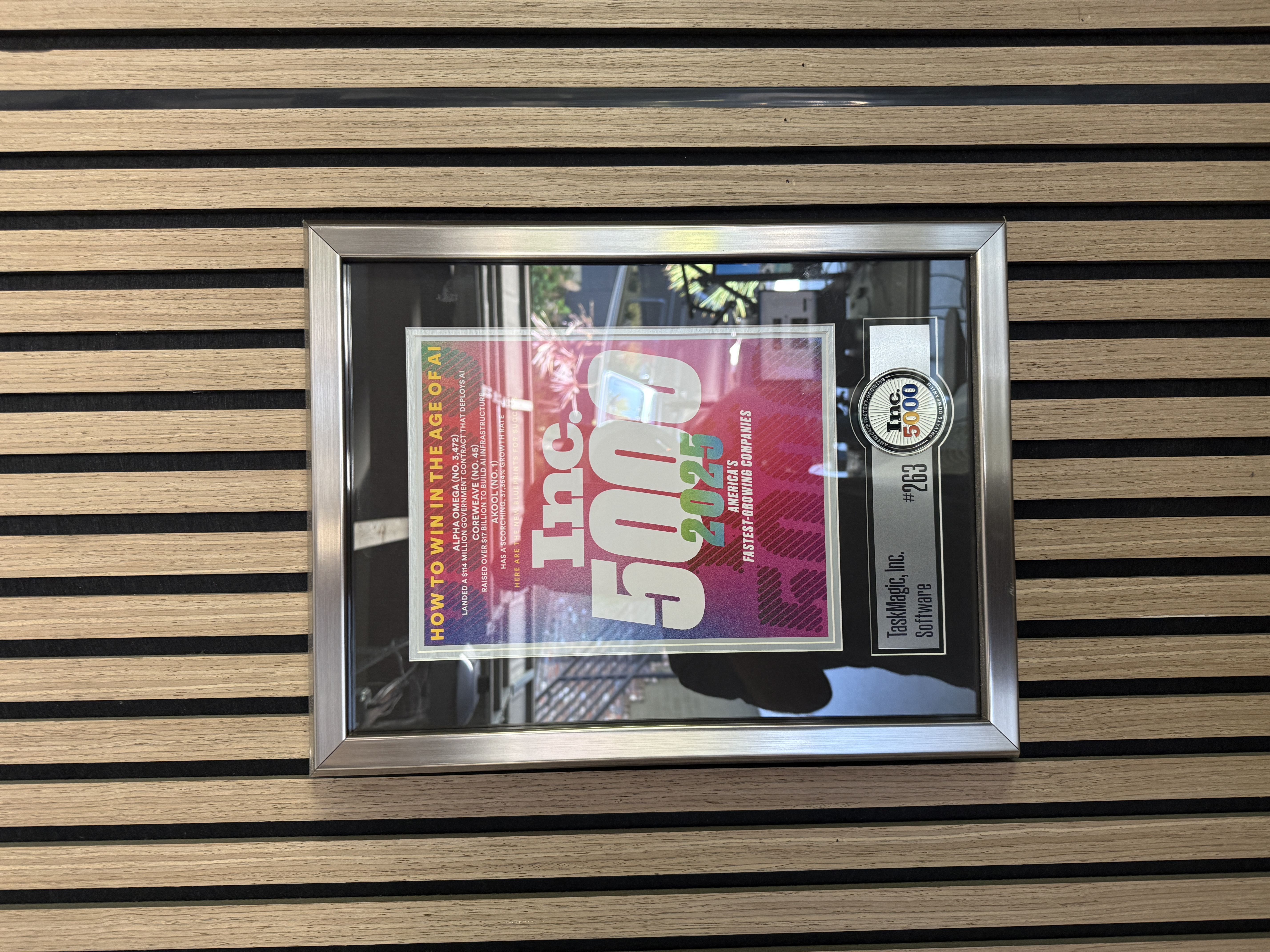 Close-up of the framed 2025 Inc. 5000 plaque for TaskMagic